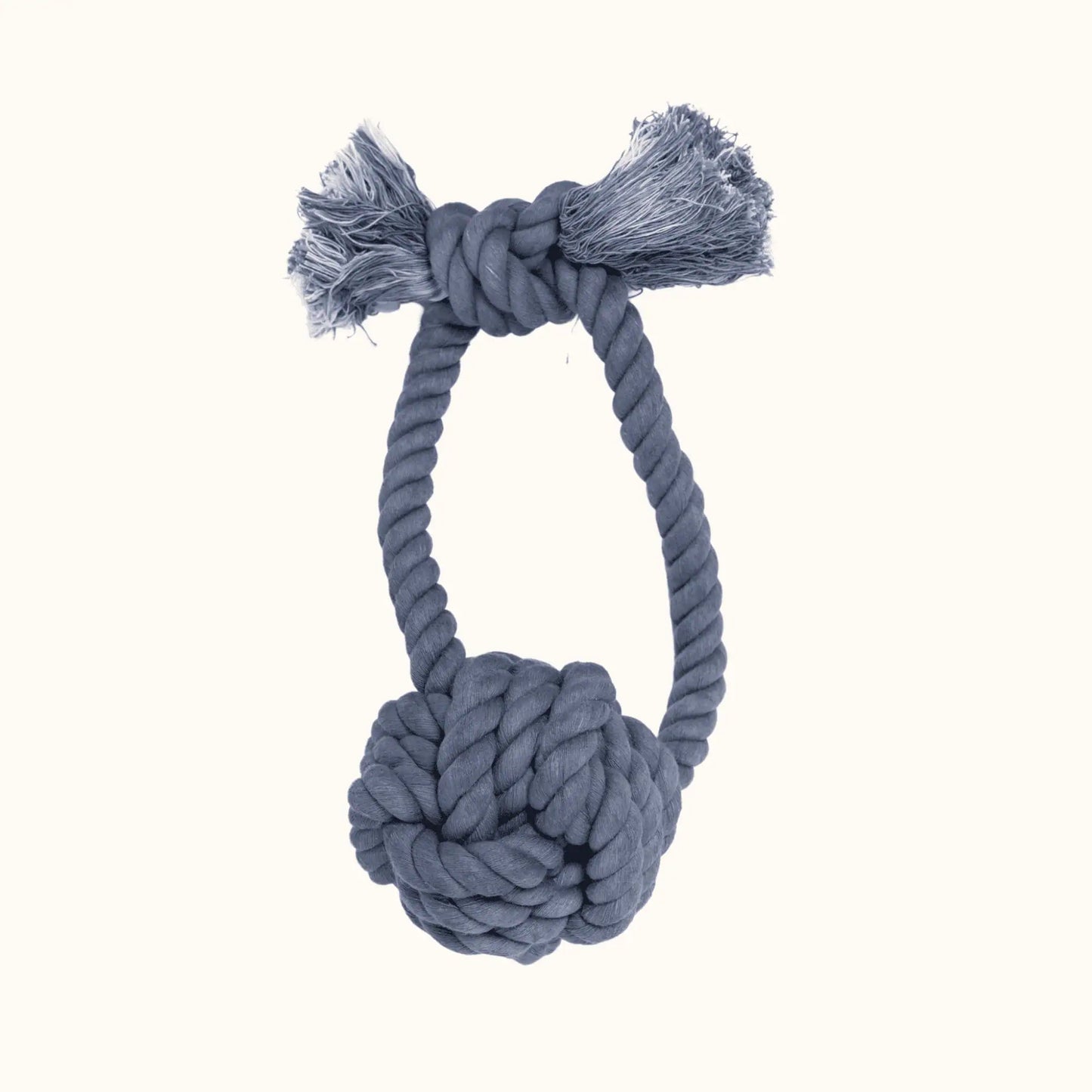A single Giant Monkey Knot dog toy in deep navy blue, featuring a tightly wound rope ball and sturdy loop with frayed ends for tugging and chewing.