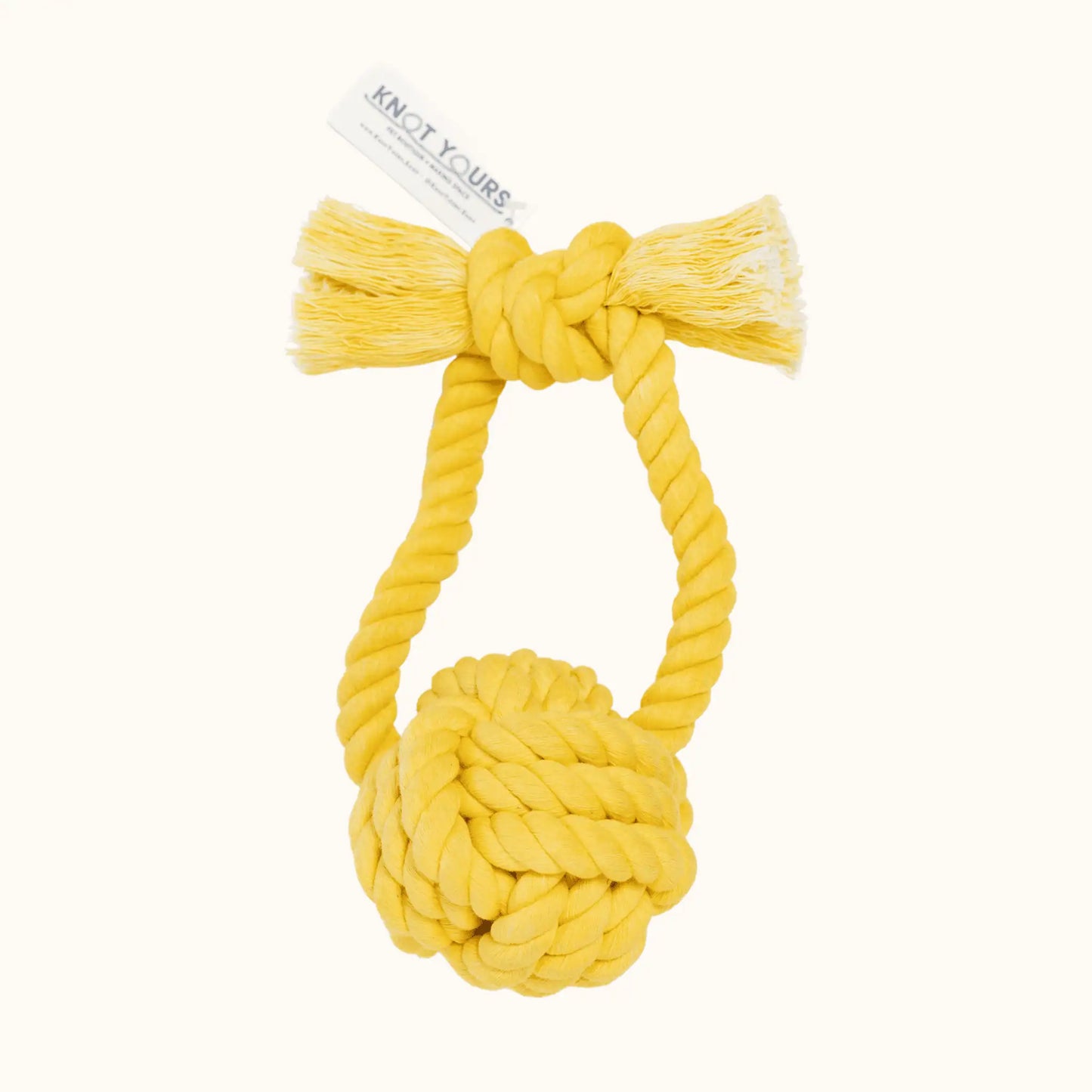 Yellow Giant Monkey Knot toy with twisted loop handle and bold rope ball, offering a cheerful, high-contrast option for active play.