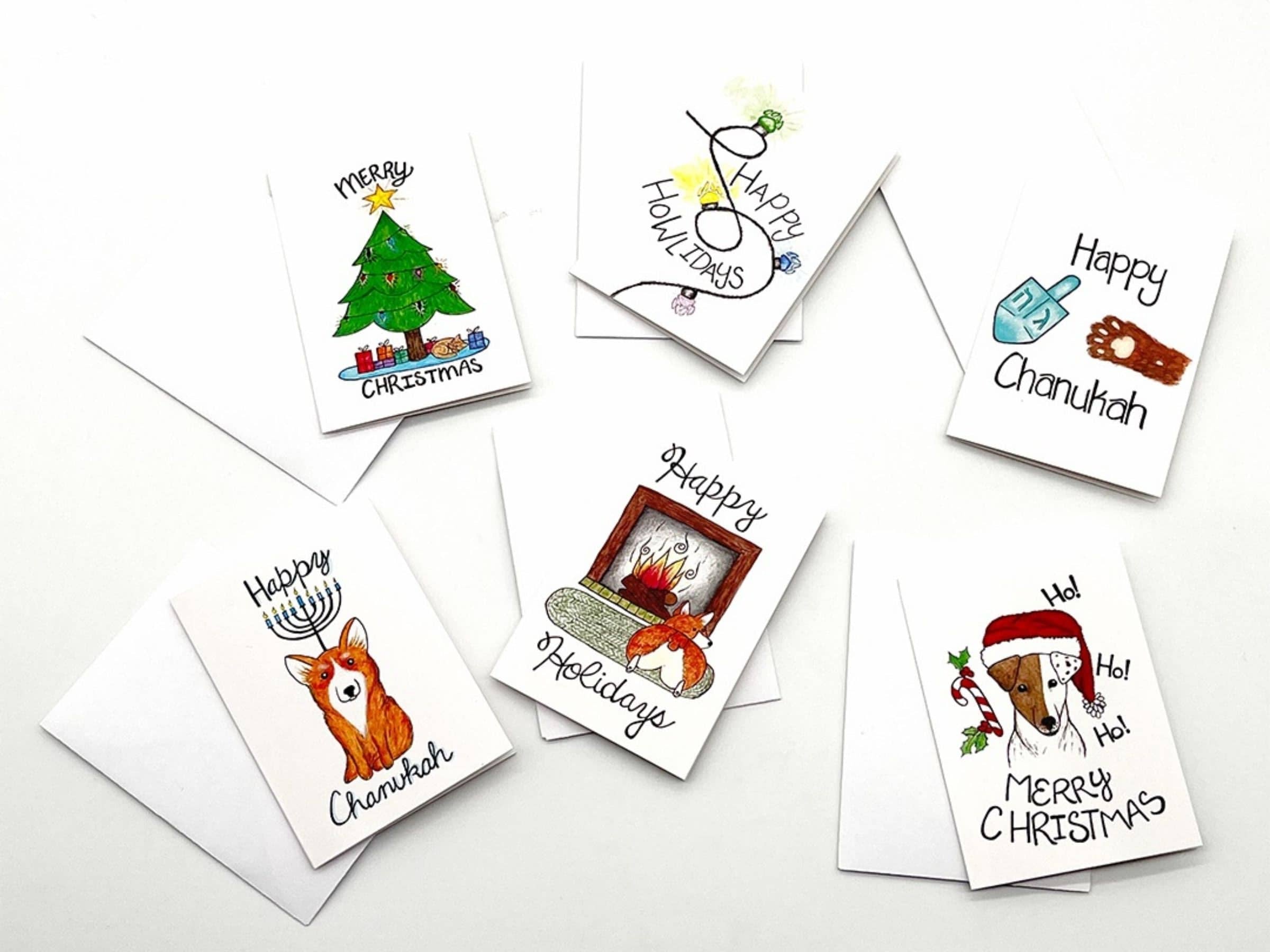 Set of six illustrated mini holiday cards featuring Christmas and Chanukah pet-themed designs, perfect gifts for pet parents.
