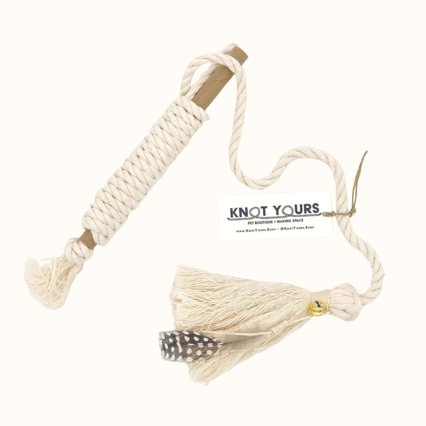 Natural cotton rope cat wand toy with tassel and feather attachment from Knot Yours, designed for interactive play with cats.