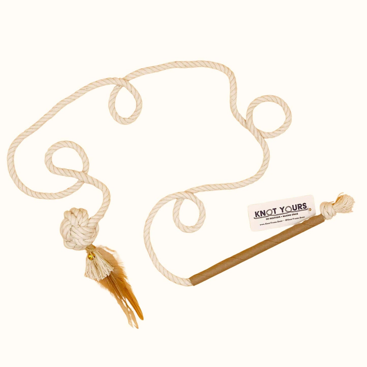 Interactive cat wand toy with a long natural cotton rope, knotted end, and feather tassel attachment for playful engagement.
