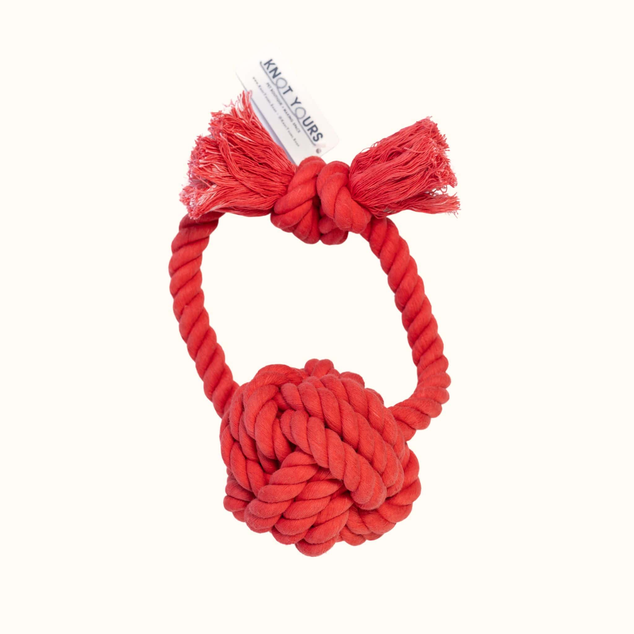 Giant Monkey Knot rope toy in bold red with loop handle and dense knot, designed for large dogs who love to tug and chew.