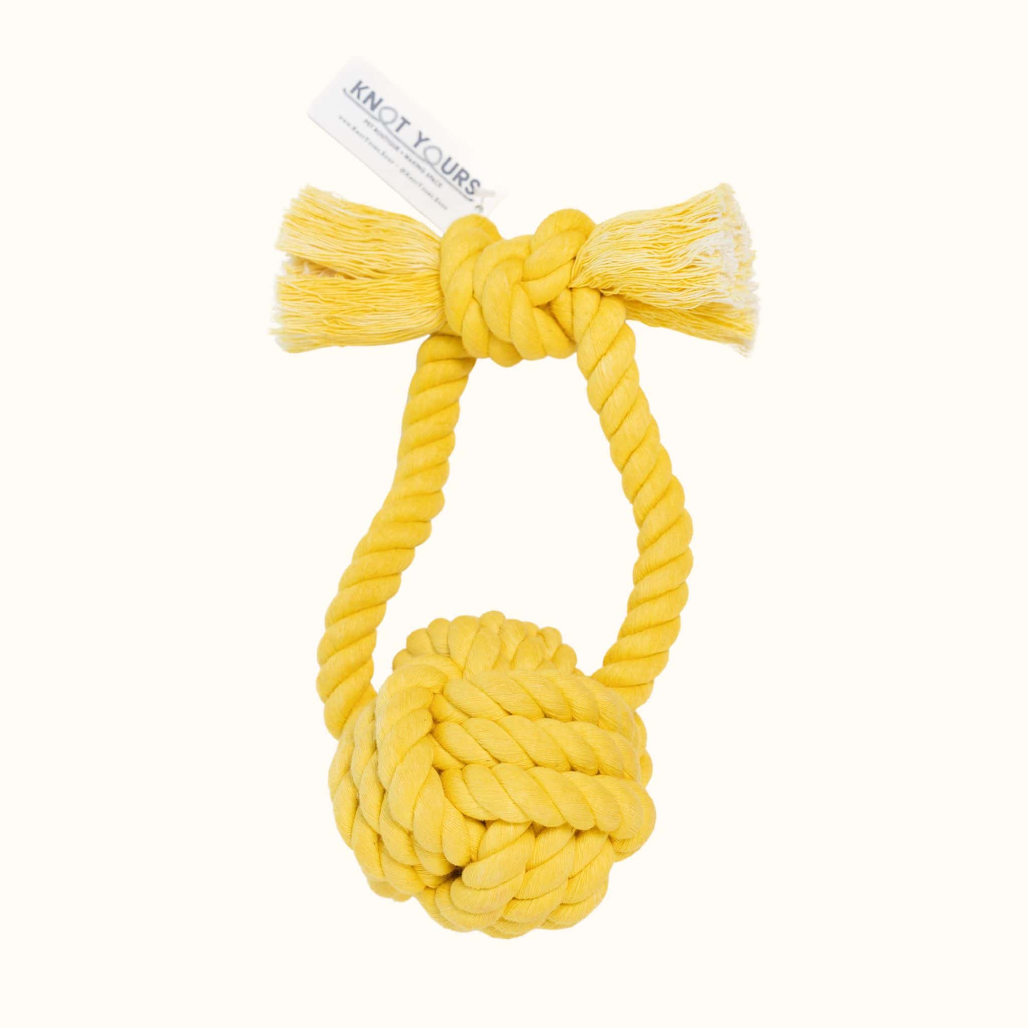 Bright yellow Giant Monkey Knot dog toy by Knot Yours, featuring a thick rope handle and durable knot for large breed dogs.