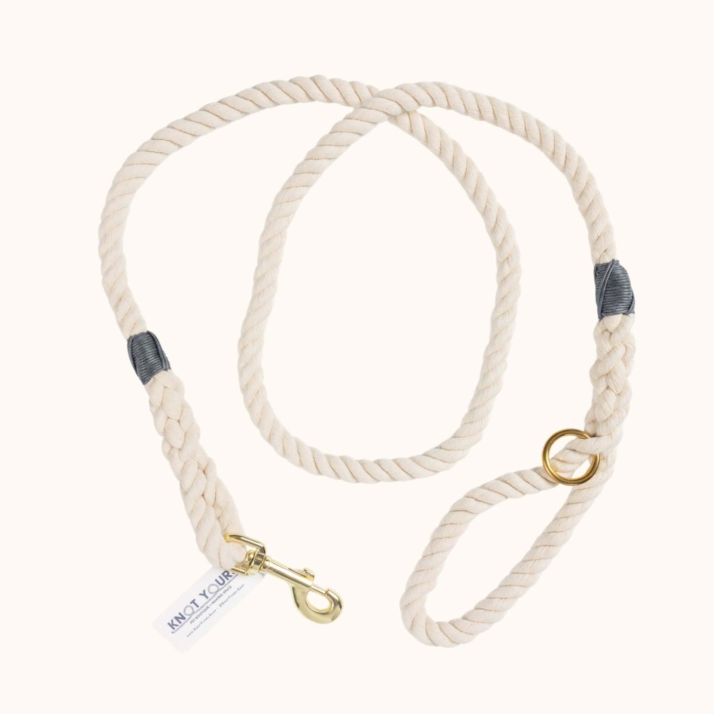 Handmade natural cotton dog leash with dark grey whipping detail.