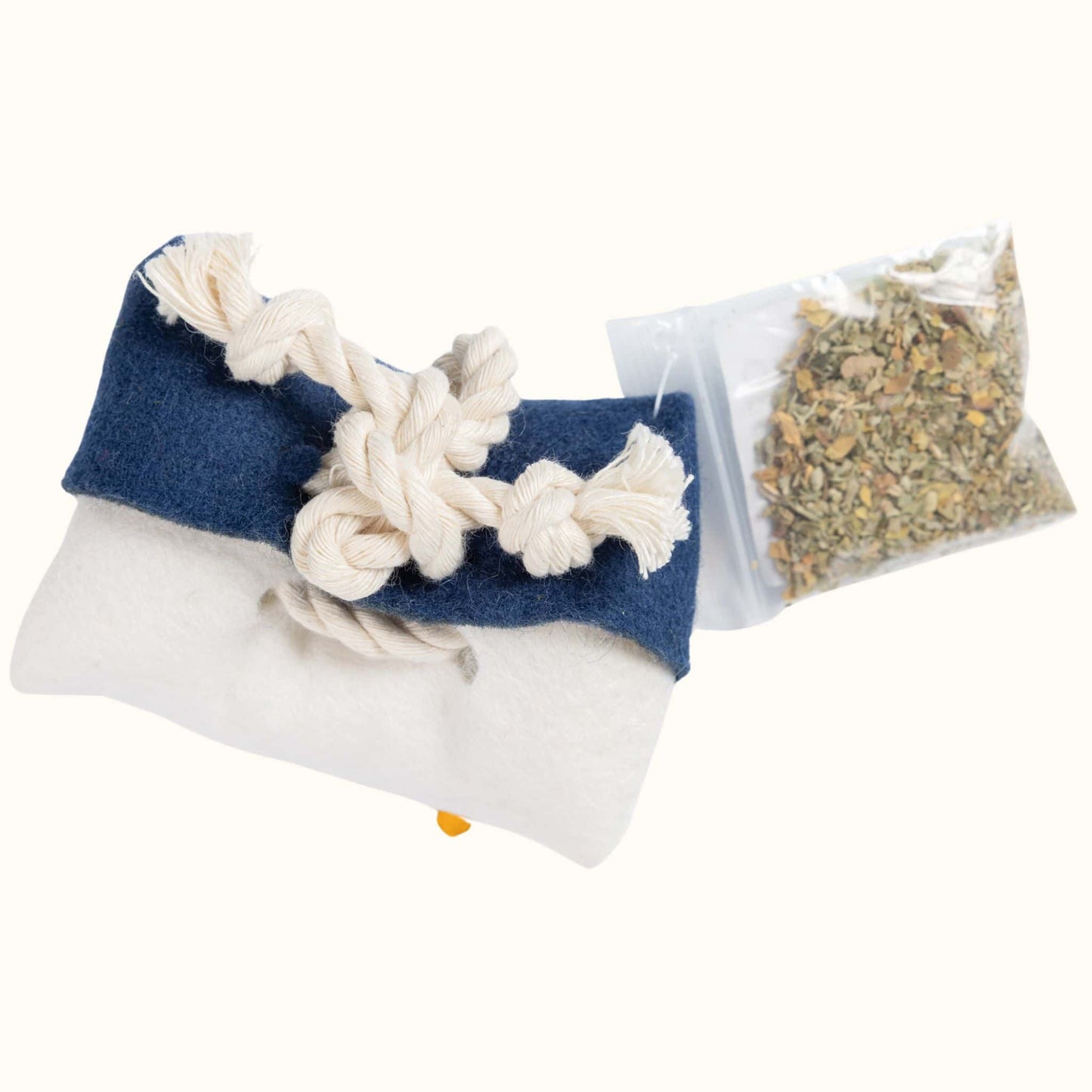 Back view of Tulsa Flag Catnip Pillow with knotted rope closure and bag of organic catnip refill.