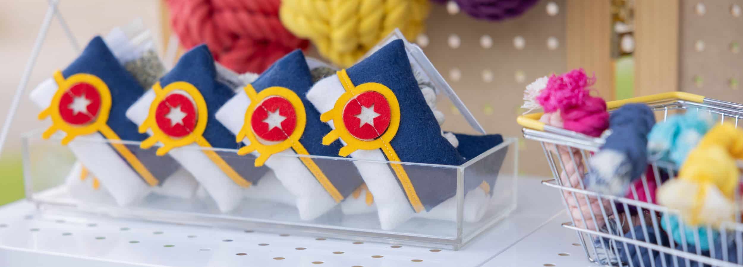 Handmade felt catnip pillow in the design of the Tulsa flag