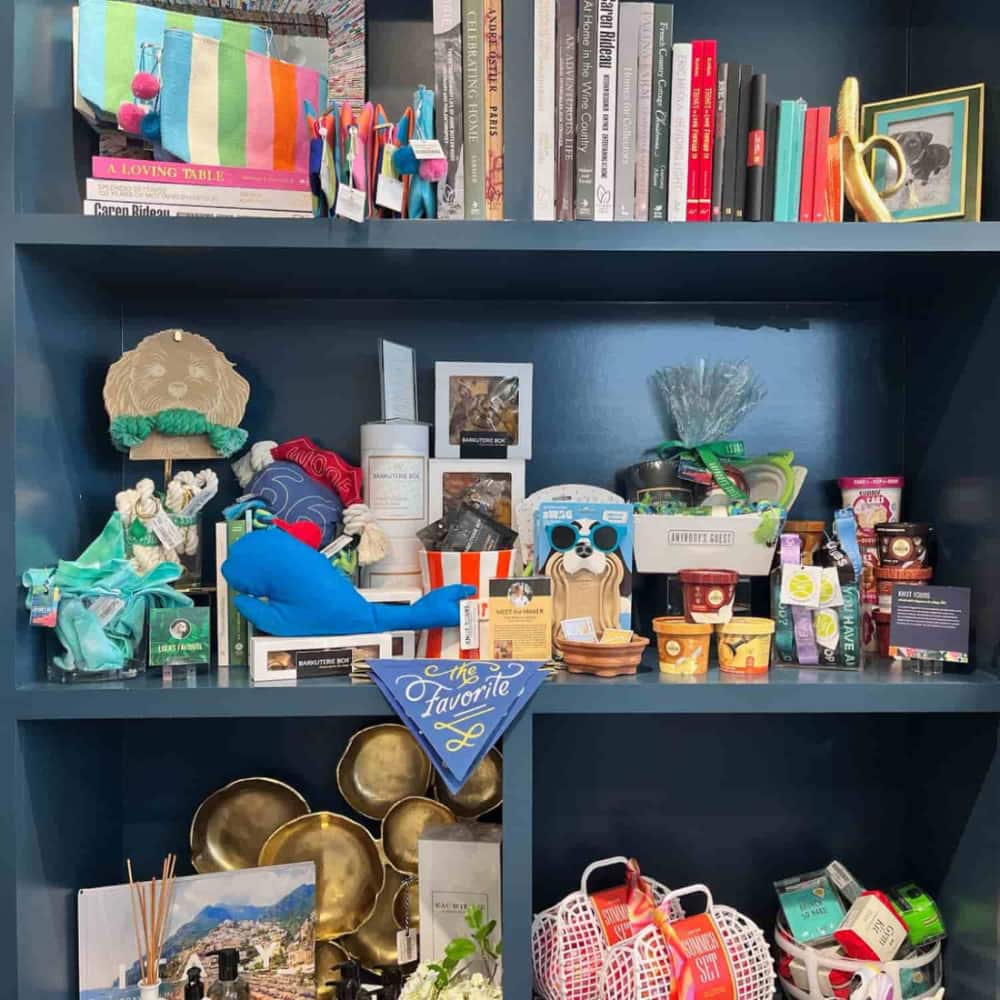 Shelves with various decorative items including books, figurines, and trinkets.