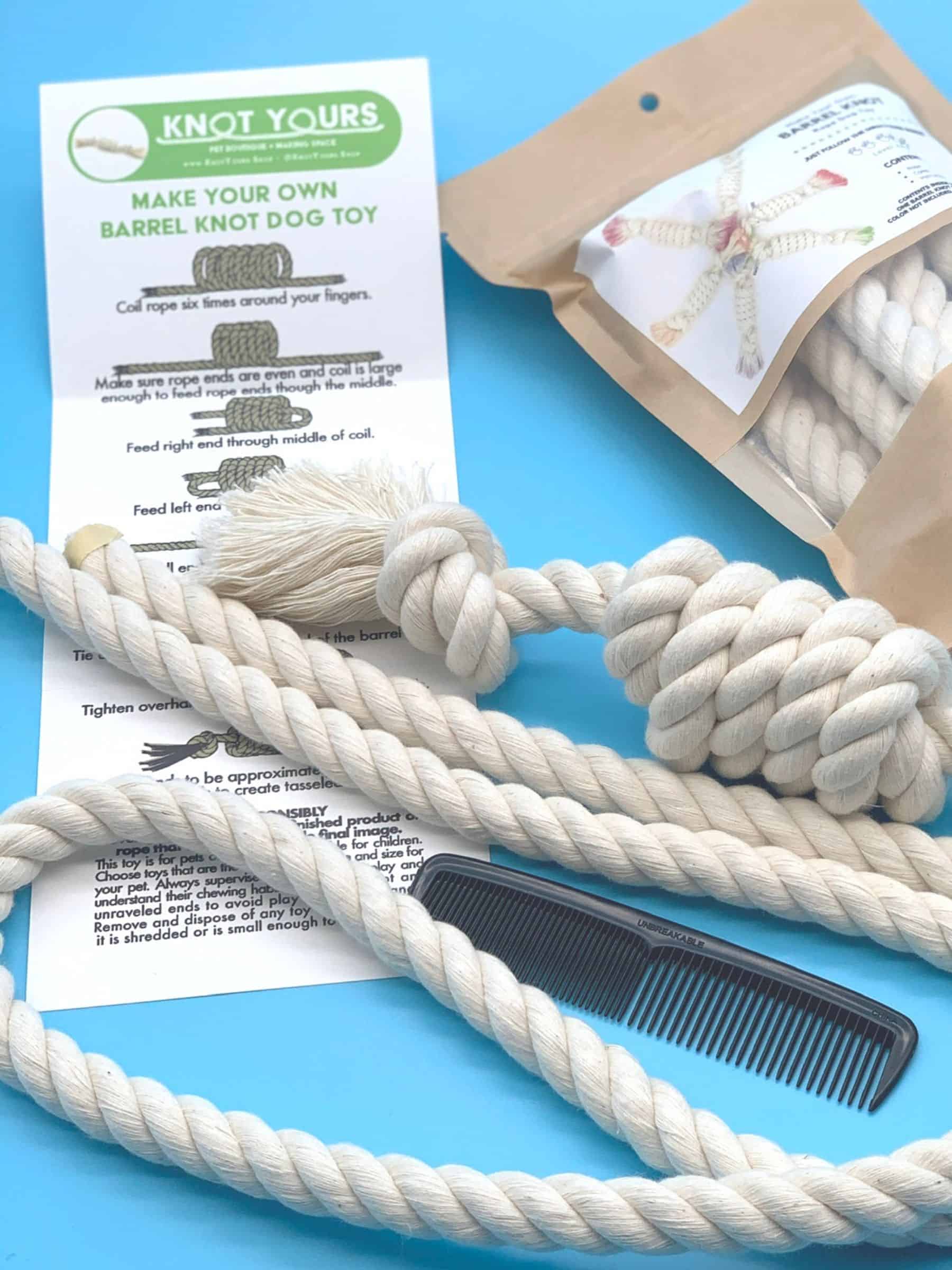 White rope dog toy with instructions, comb, and packaging on a blue background