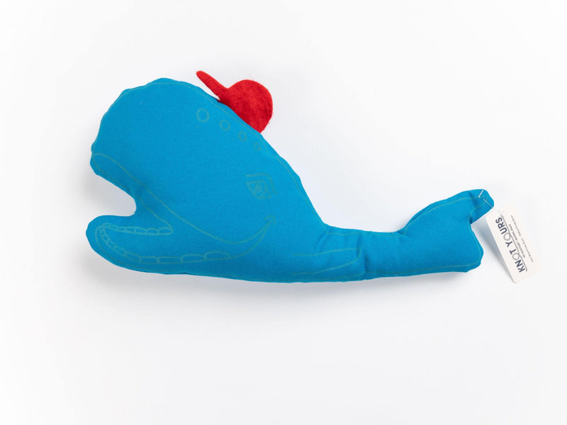 Solo view of the handmade blue whale squeaky animal dog toy by Knot Yours, featuring a stitched smile and red felt hat