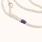 Custom natural purple rope dog leash with braided handle and light purple whipping
