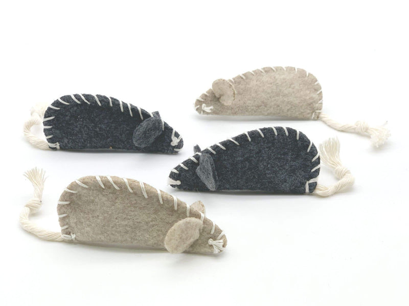 Set of four felt mouse cat toys in grey and beige with stitched edges and rope tails, soft catnip toys for cats.