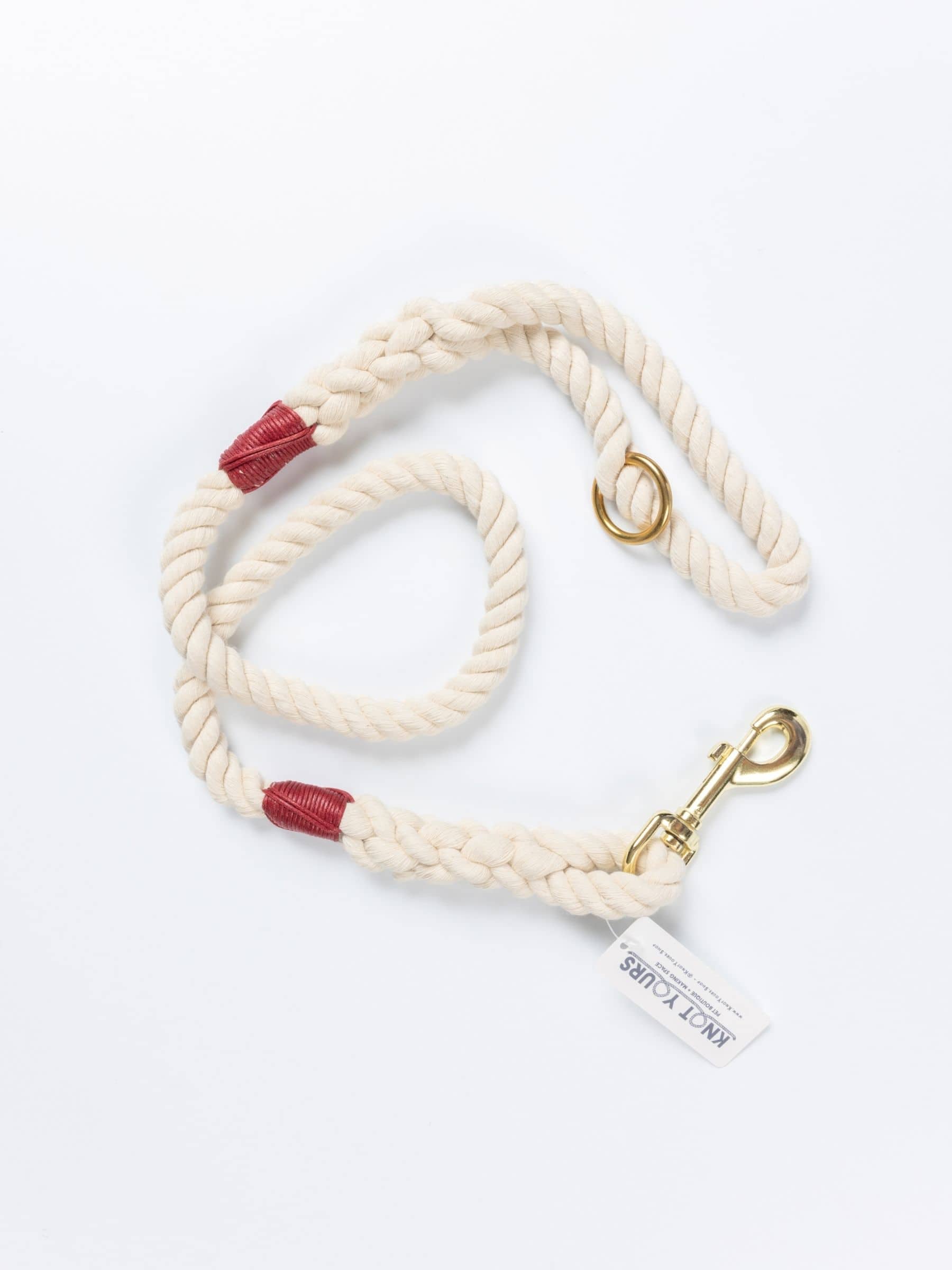 Handmade natural cotton dog leash with burgundy whipping and sturdy braided rope.