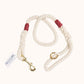Handmade natural cotton dog leash with burgundy whipping and sturdy braided rope.