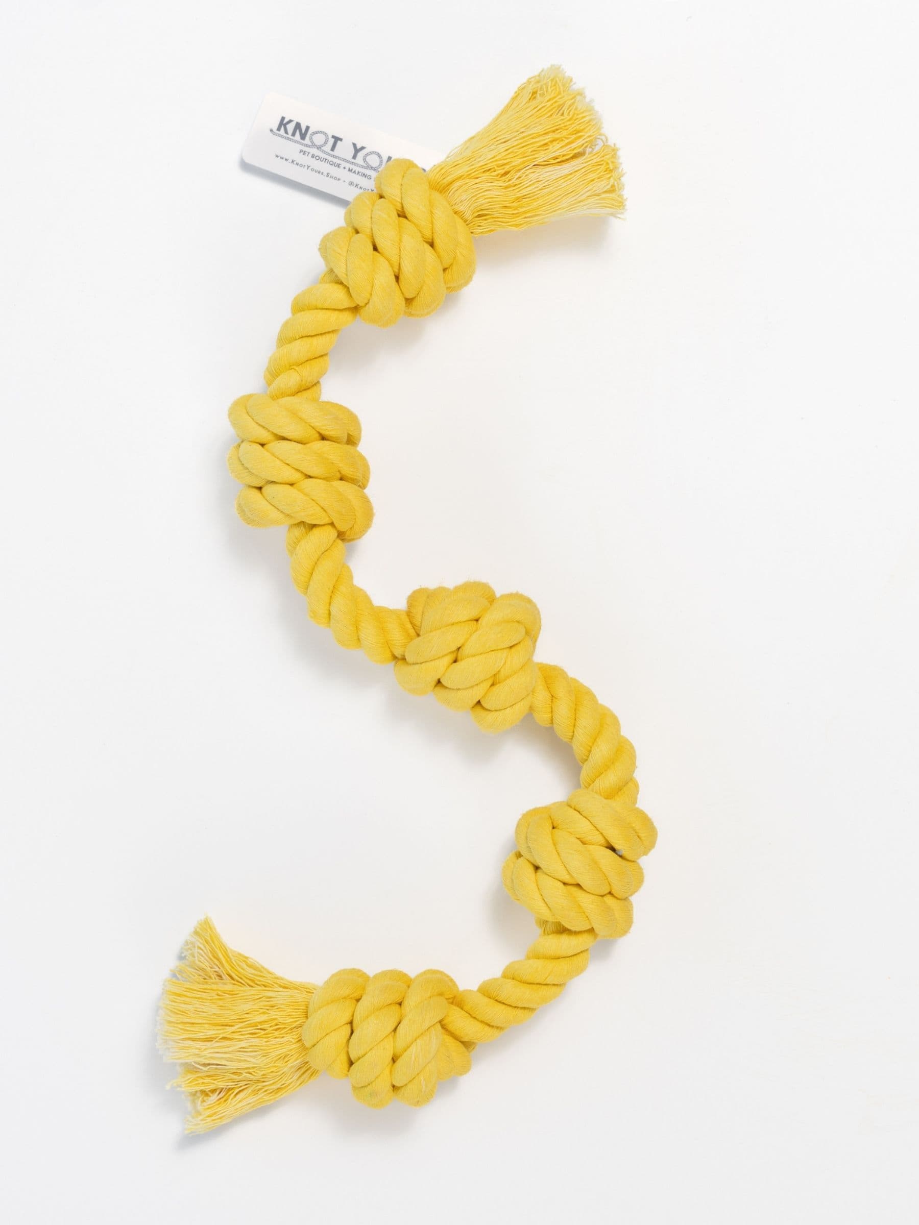 Yellow Little Gigantic dog rope toy with five knots and frayed ends