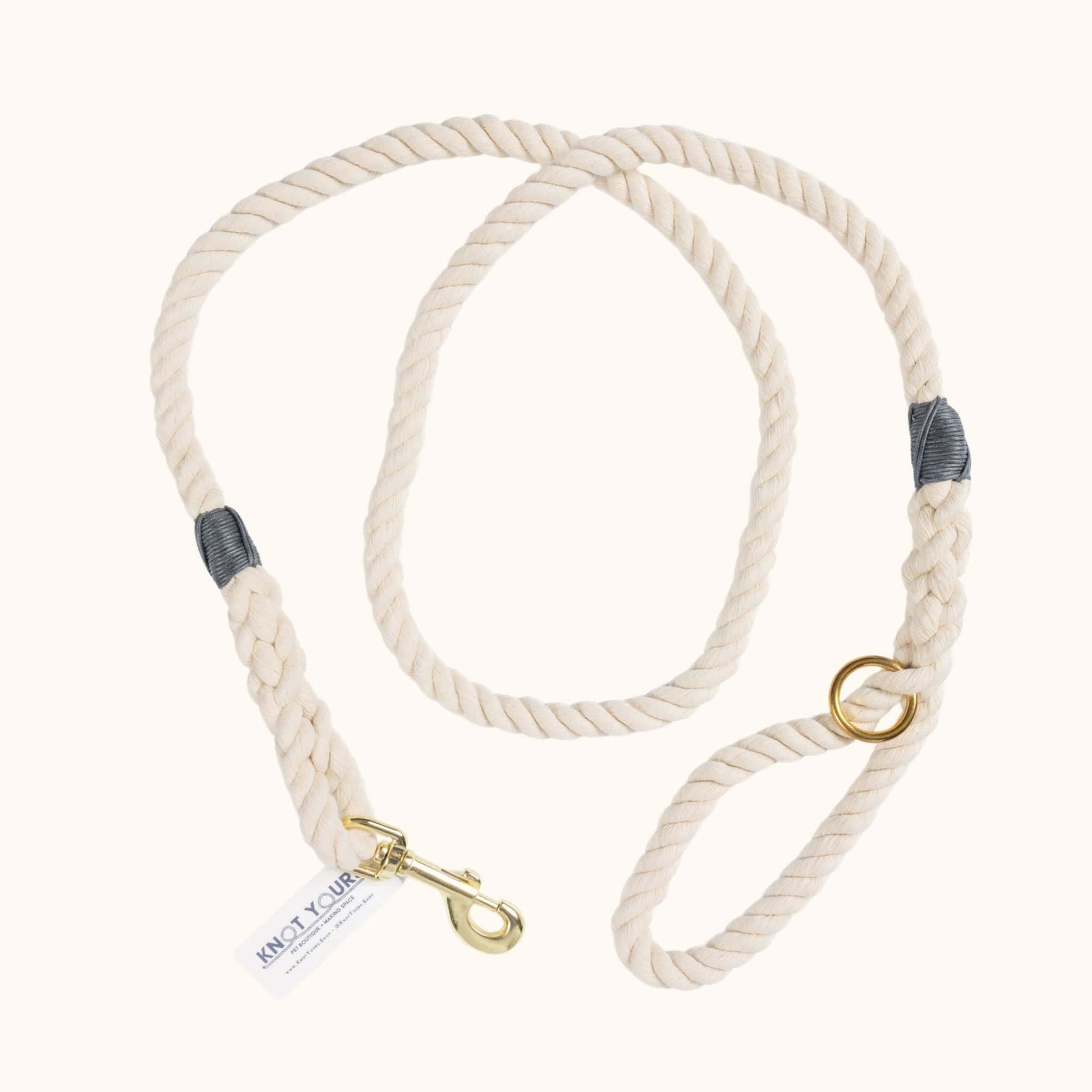Handmade natural cotton dog leash with dark grey whipping detail.