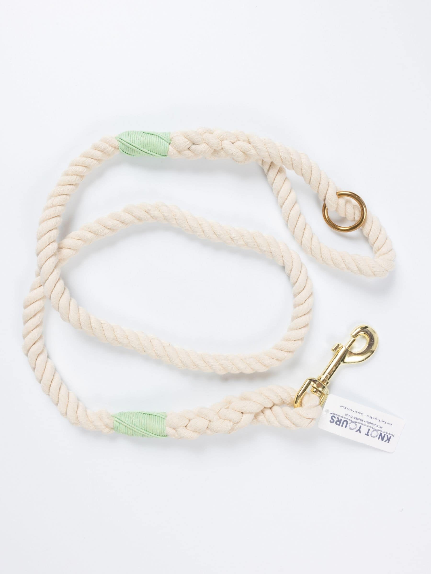 Custom natural rope dog leash with mint green whipping detail and brass clasp.