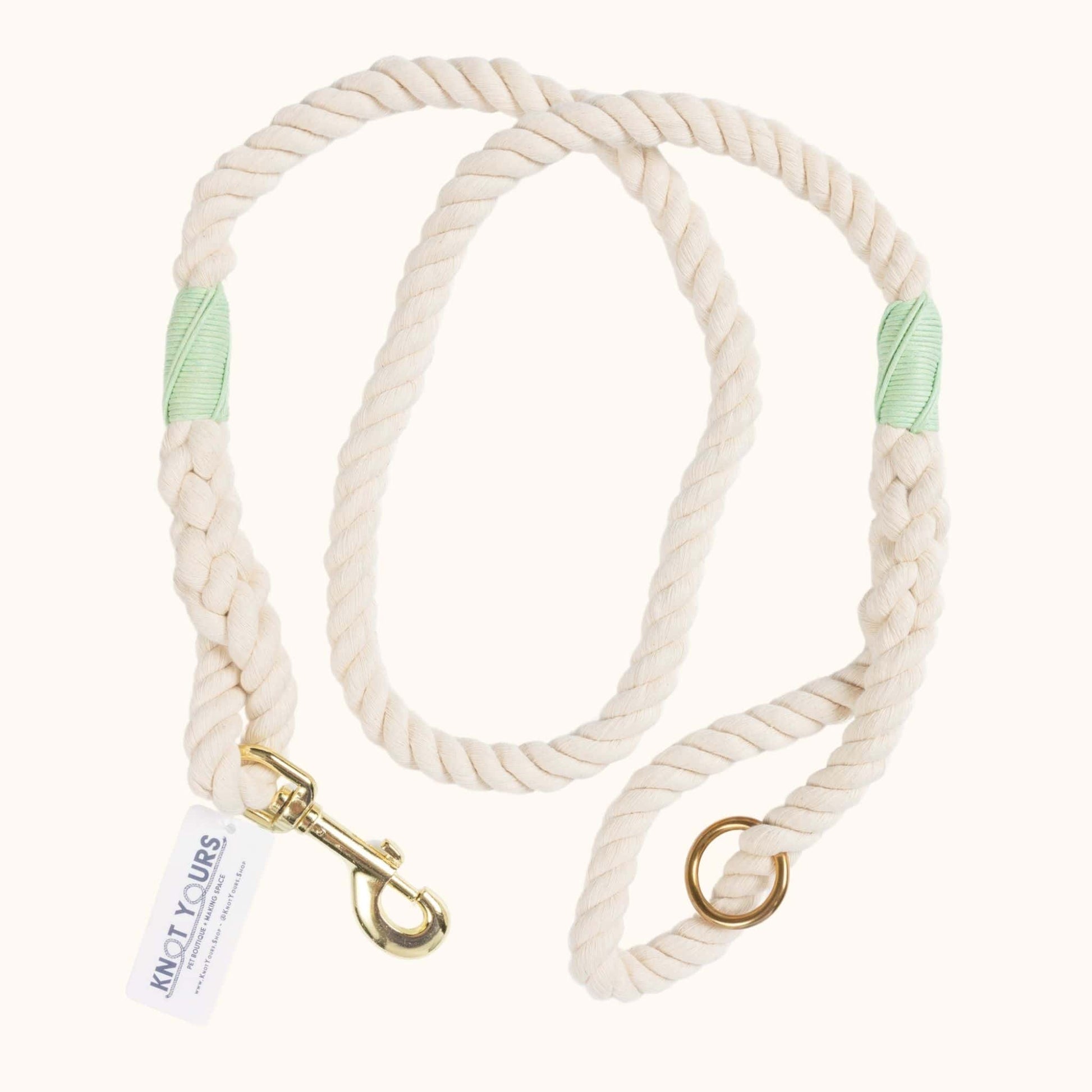 Custom natural rope dog leash with mint green whipping detail and brass clasp.