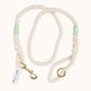 Custom natural rope dog leash with mint green whipping detail and brass clasp.