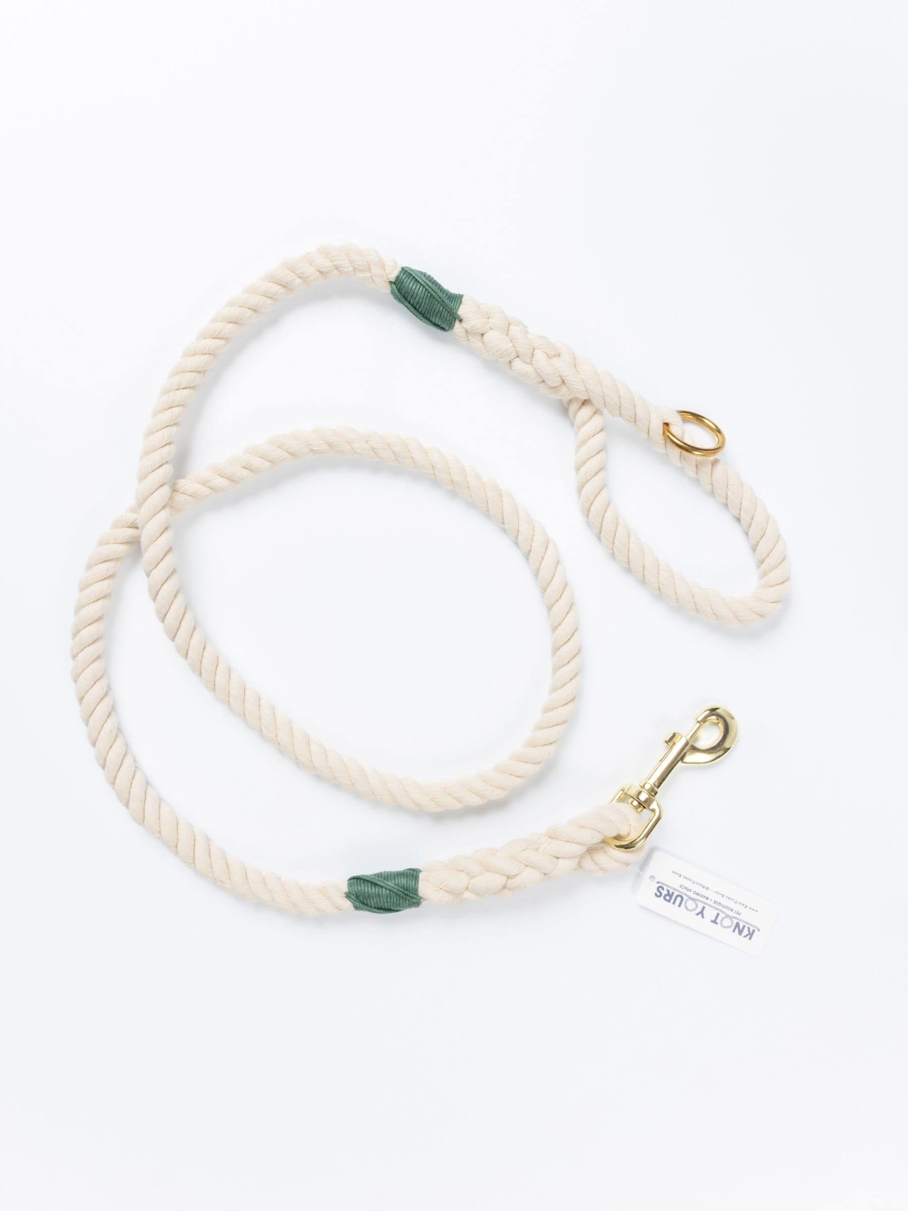 Custom rope dog leash with dark green whipping detail and brass clasp.