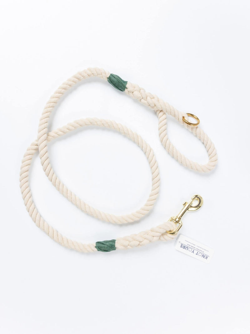 Custom rope dog leash with dark green whipping detail and brass clasp.