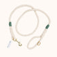 Custom rope dog leash with dark green whipping detail and brass clasp.