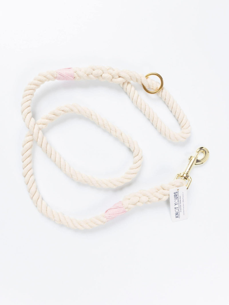 Custom natural rope dog leash with light pink whipping detail and brass clasp.
