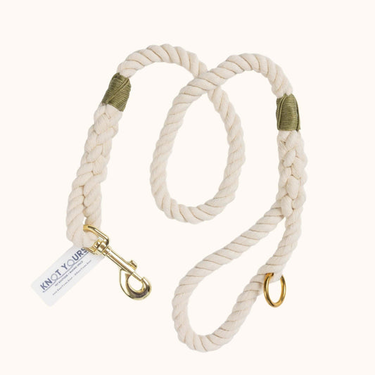 Custom natural rope dog leash with olive green whipping detail and brass clasp.