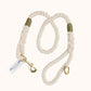 Custom natural rope dog leash with olive green whipping detail and brass clasp.