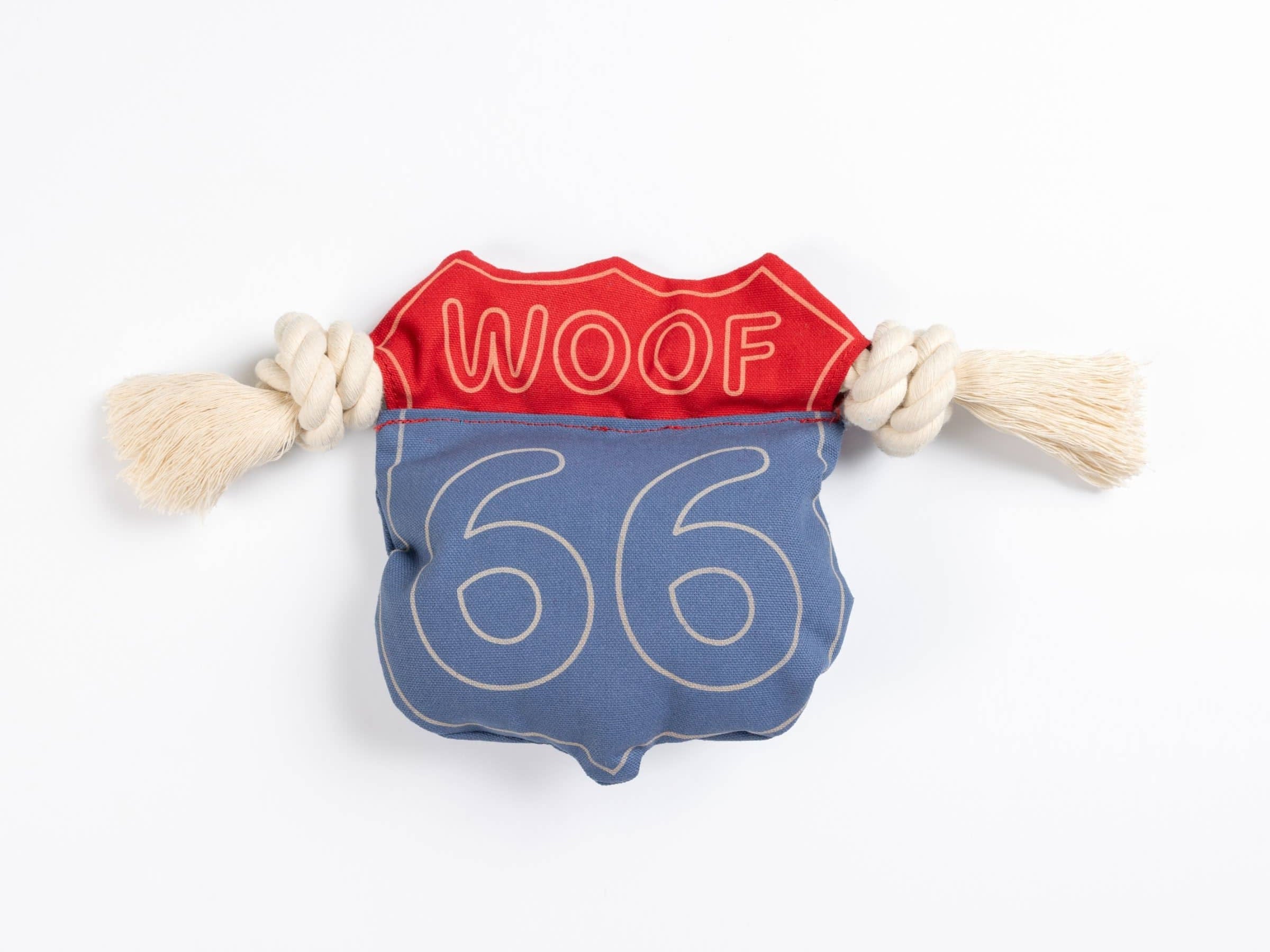 A dog chew toy made with blue and red canvas that has '66' and 'WOOF' text on it with rope knots on either side